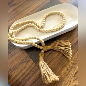 Threshold wood tray and beaded garland decor